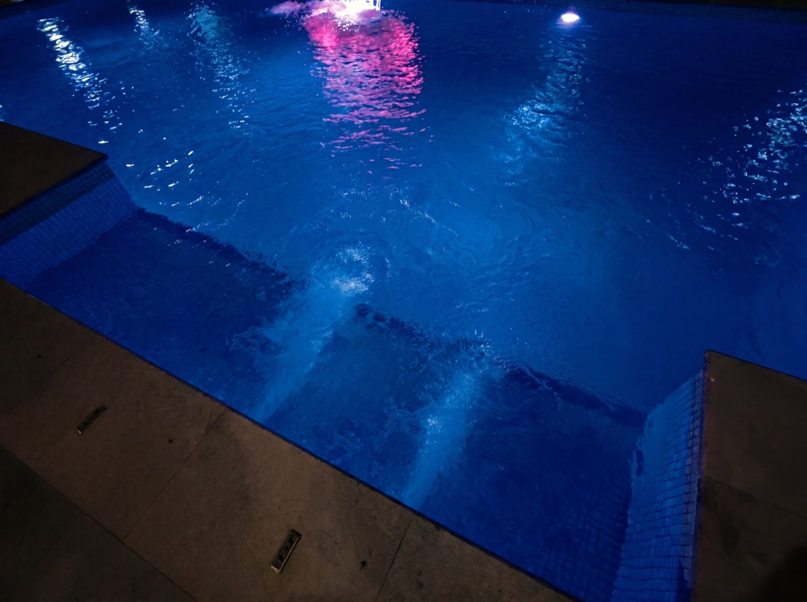 Pool lit up at night